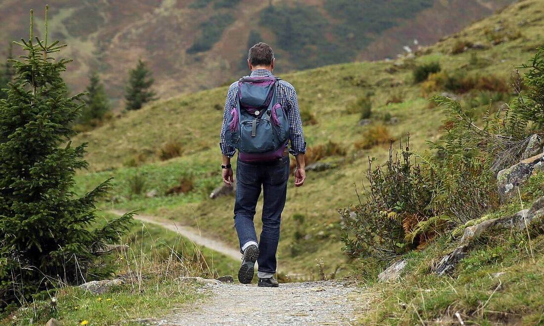 Hikers exploring a scenic mountain trail
